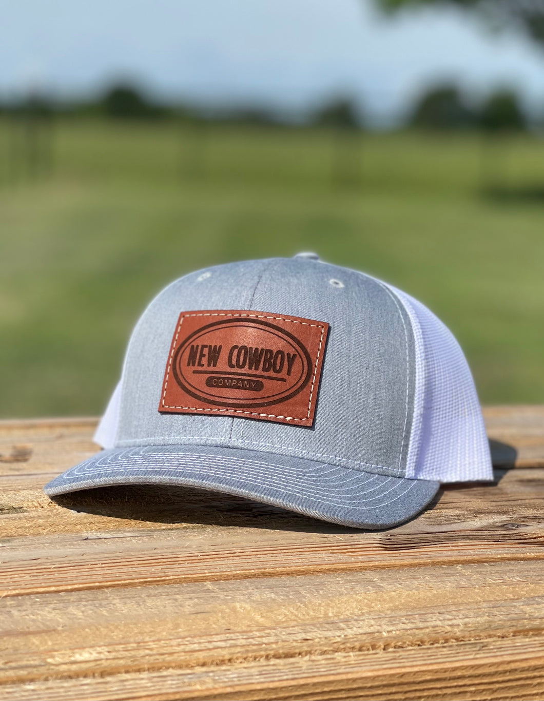 Grey/White Leather Trucker